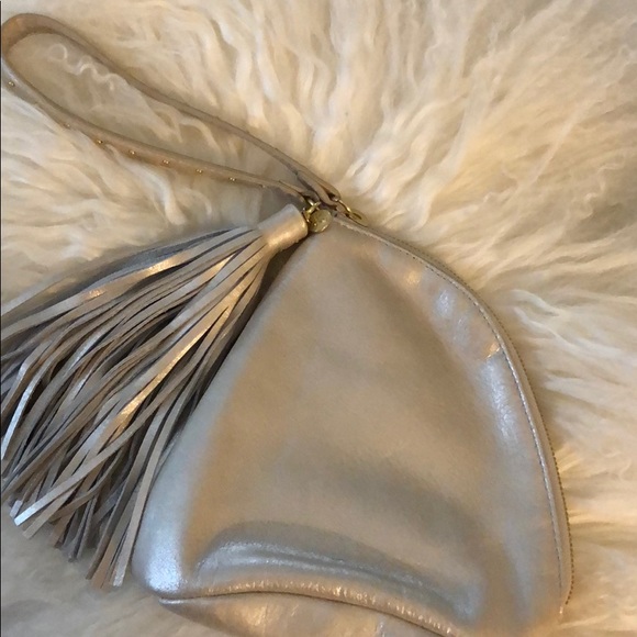 HOBO Handbags - HOBO silver Metallic clutch with fringe